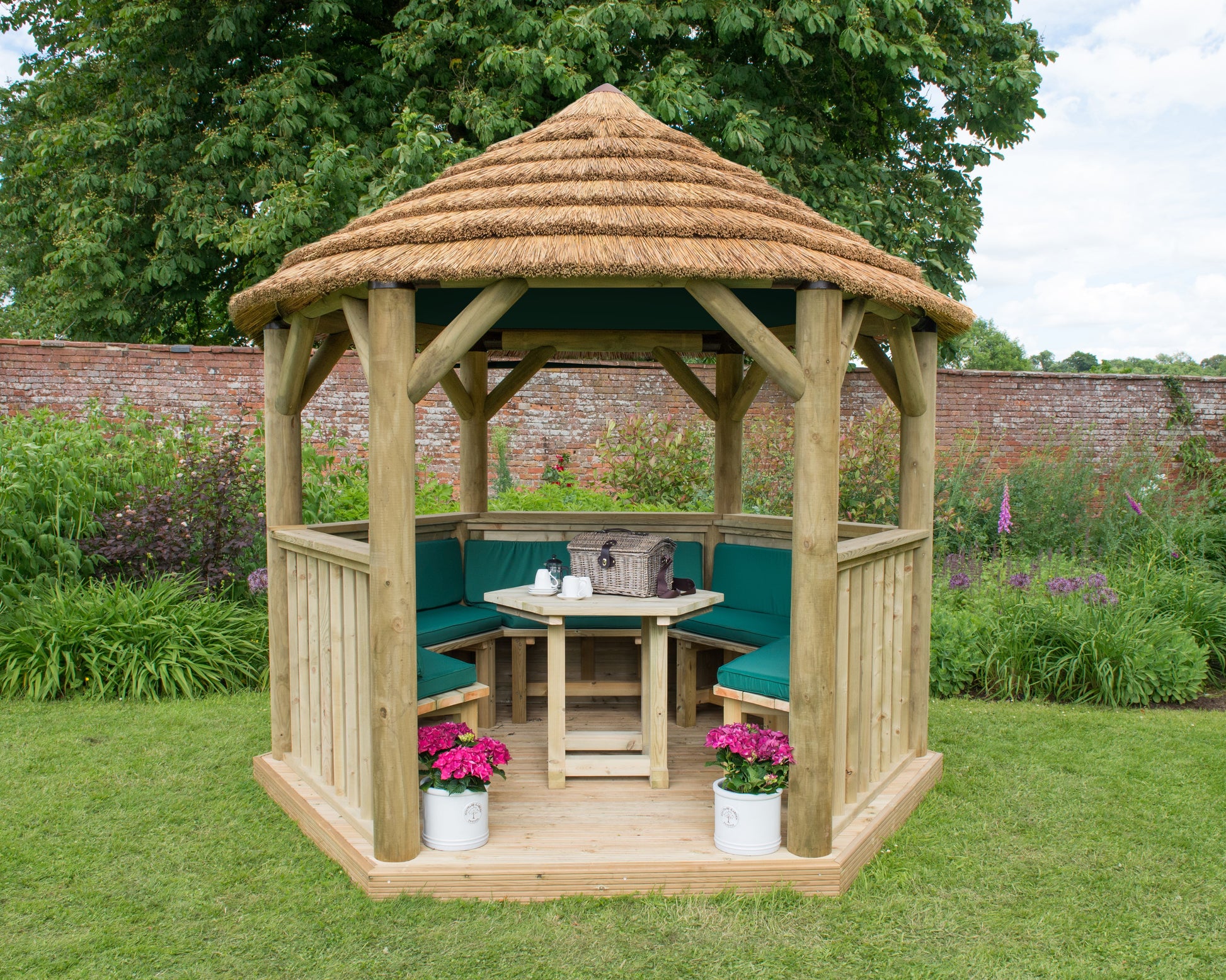 Image for Forest 3m Hexagonal Wooden Garden Gazebo with Thatched Roof - Furnished (Green)