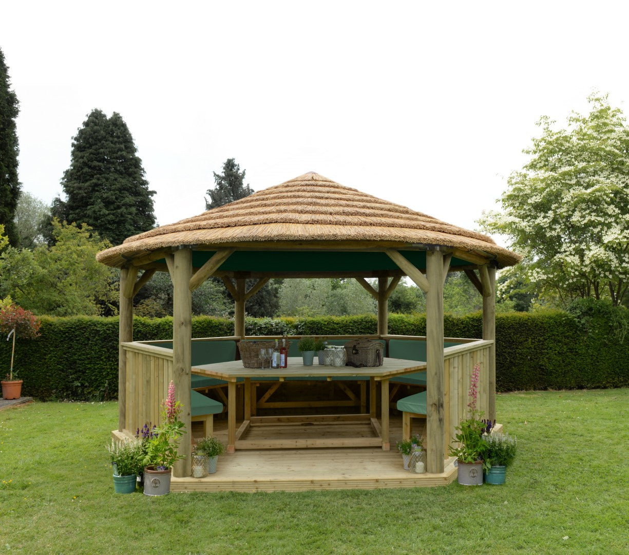 Image for Forest 4.7m Hexagonal Wooden Garden Gazebo with Thatched Roof - Furnished (Green)