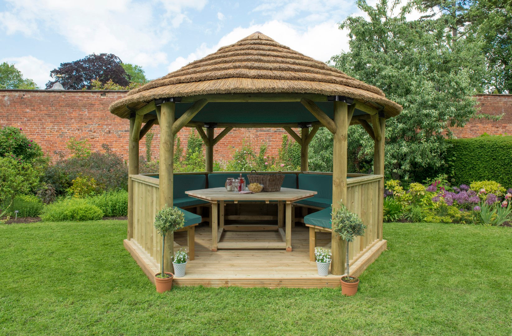 Image for Forest 4m Hexagonal Wooden Garden Gazebo with Thatched Roof - Furnished (Green)